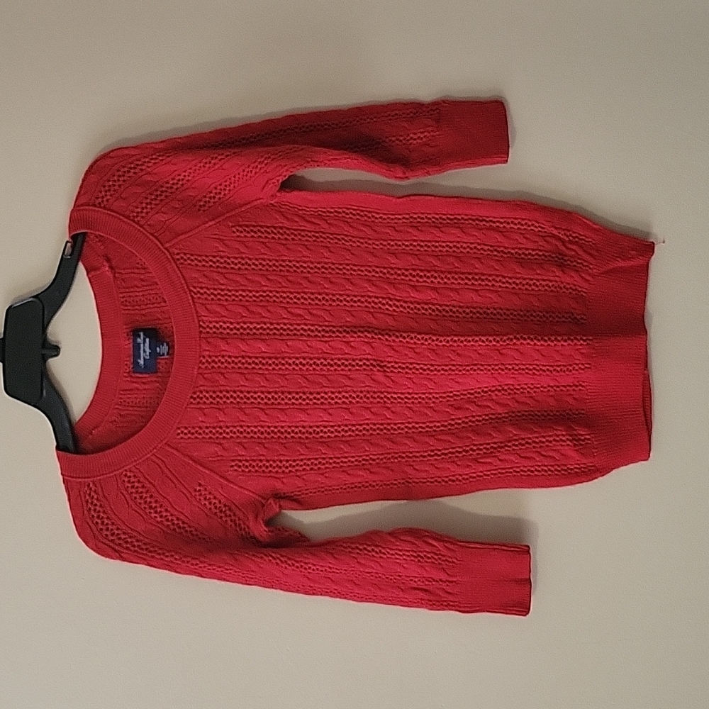 A small red AE sweater